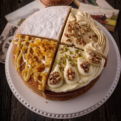 cake made up of 4 different flavours, carrot, coffee, lemon and victoria sponge cake