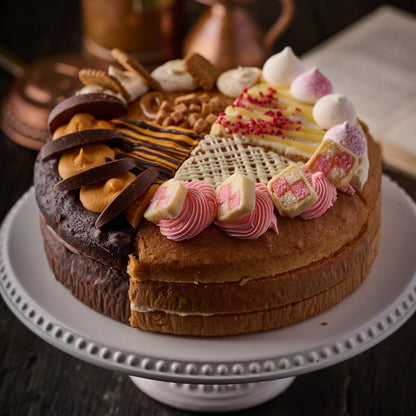 Four flavour sharing cake 10 inch with Biscoff, Chocolate Orange, Raspberry Lemon Meringue and Battenberg, UK nationwide delivery celebration cake